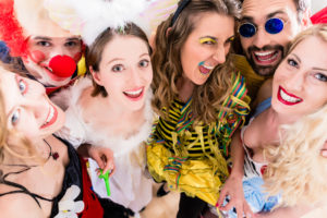 Women and men celebrating at party